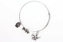 Silver Tone Charm Bangle with Hamsa Hand, Hope, and Genie Lamp Charms