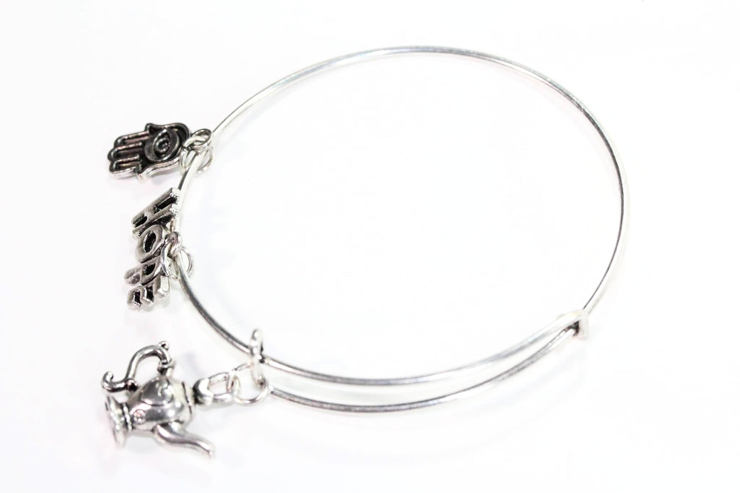 Silver Tone Charm Bangle with Hamsa Hand, Hope, and Genie Lamp Charms