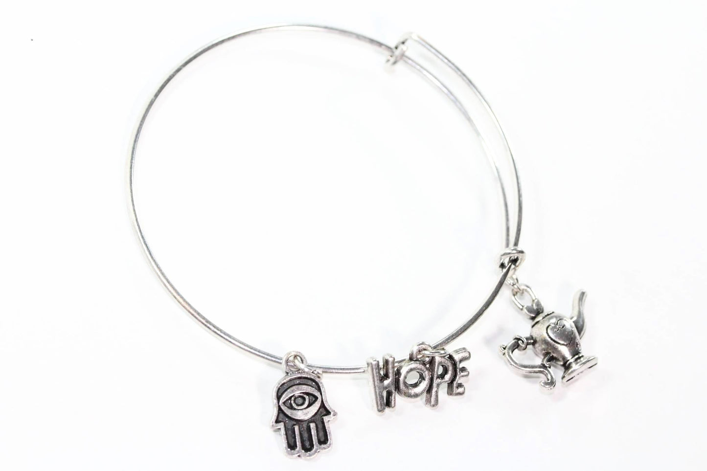 Silver Tone Charm Bangle with Hamsa Hand, Hope, and Genie Lamp Charms